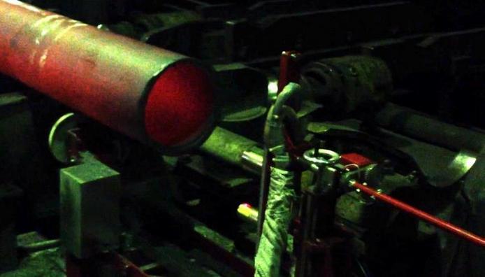 Hot seamless pipe geometry control system